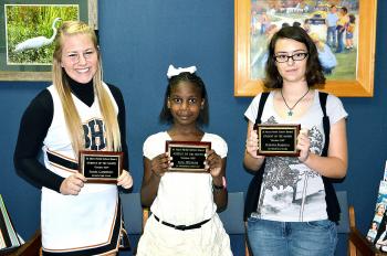 The October students of the month were announced during Thursday’s St. Mary Parish School Board meeting. They are, from left, Sarah Carpenter, 12th-grader at Berwick High School; Tera Williams, fifth-grader at J.A. Hernandez Elementary; and Brianna Persilver, eighth-grader at B.E. Boudreaux Middle.
