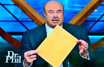 Family members of the late Glenn Lemoine appeared on the "Dr. Phil" show Tuesday. Dr. Phil McGraw holds up the results of a polygraph test. 