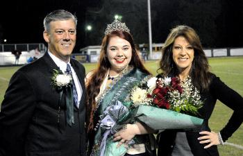 Morgan City High School’s homecoming queen was presented by her parents during Friday’s football game against Ellender. From left are her father, Tim Spiese; queen Nicole Perri; and mother, Christine Spiese.
