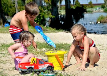 Kiley Blanchard, 2, Bryson Legnon, 4, and Brittney Duval, 5, enjoy an afternoon at Lake End Park in Morgan City Monday. Lake End Park of Morgan City will also be the site of the La Fête d’Ecologie Festival from 10 a.m. to 5 p.m. Saturday. La Fête d’Ecologie is a celebration of the environment, history and the unique blend of cultures found in the Barataria-Terrebonne National Estuary.