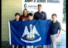 The American Legion Post 242 donated a new Louisiana state flag to Morgan City's M.E. Norman Elementary School Color Guard, front, from left, Ashton Money, Ben Lewis and Joseph Daigle. Back, from left, Lisa Hampton, M.E. Norman teacher, and Troy Larive, American Legion Post 242 representative.
