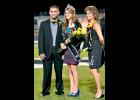 Berwick High School Homecoming Queen Sara Swisher, center, is escorted by her brother, Stephen Swisher III and her mother, Cindy Businelle, during the homecoming game Friday. 
